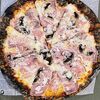 Black pizza в Bon appetit по цене 975