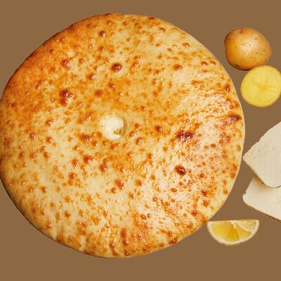 Осетинский пирог с картофелем и сыром в Totoro по цене 1199 ₽