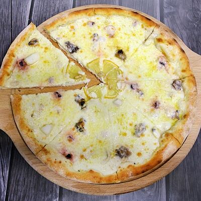 Пицца Нептун с морепродуктами в Pizza Mamma Mia по цене 600 ₽