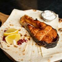 Стейк из форели на углях в Кафе Мясо