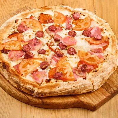 Пицца Мясное плато в 4 сыра по цене 990 ₽