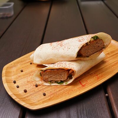 Люля-кебаб из свинины и курицы в лаваше в The Кухня по цене 350 ₽