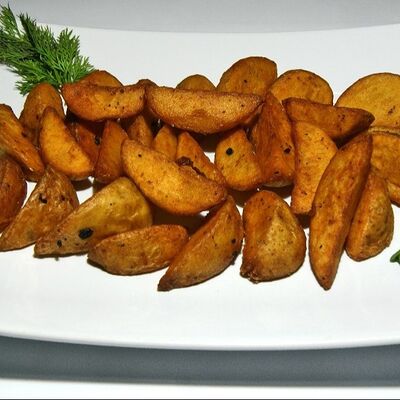 Картофель по-деревенски в CHILLI по цене 250 ₽