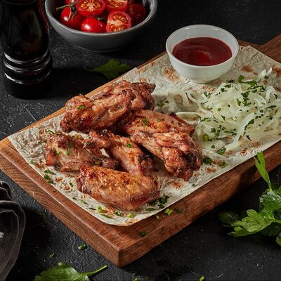 Шашлык из куриных крыльев в #наУГЛЯХ по цене 530 ₽
