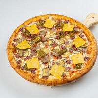 Пицца с колбасками и острым перцем в Unit