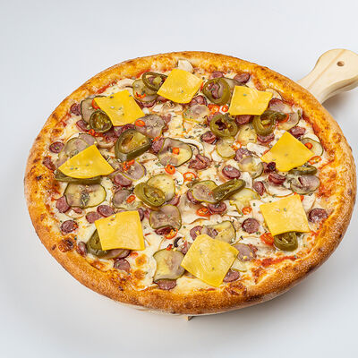 Пицца с колбасками и острым перцем в Unit по цене 770 ₽