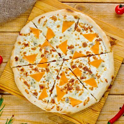 Пицца Четыре Сыра в Белый Аист по цене 620 ₽