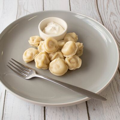 Пельмени домашние с маслом в Гудди по цене 300 ₽