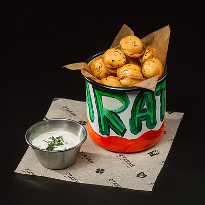 Пельмешки фри в Harats Pub по цене 460 ₽