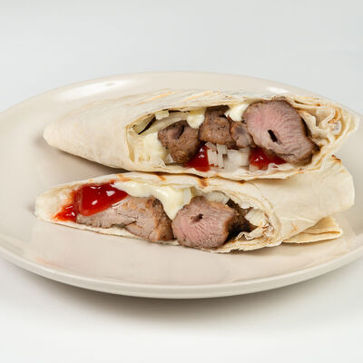 Шашлык из свинины в лаваше в Мясо на углях по цене 290 ₽