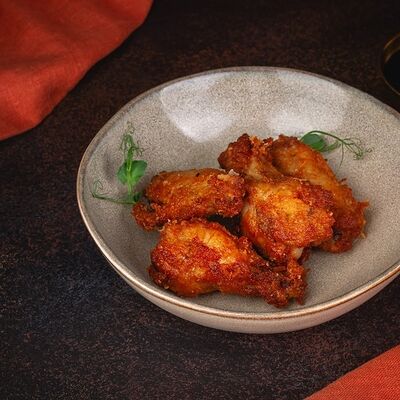 Куриные крылья в панировке в Fila по цене 350 ₽