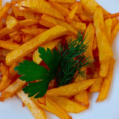 Картофель жареный в Вкусно еда по цене 249 ₽