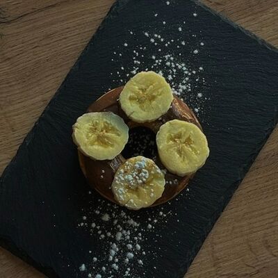 Пончик шоколад-банан в Пончик по цене 80 ₽