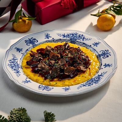 Ризотто алла Миланезе с утиными сердечками и черным трюфелем в Salone pasta & bar по цене 1790 ₽