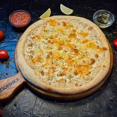 Пицца Четыре сыра в Японика по цене 990 ₽