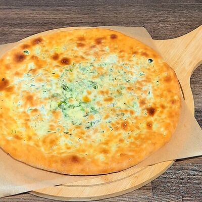 Осетинский пирог с зеленью и сыром в Шашлычная угли по цене 550 ₽