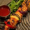 Шашлык из свиной шеи и овощами грильв Хаос гастро особняк по цене 990