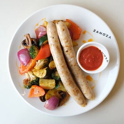 Печёные овощи с куриными сосисками в Zanoza по цене 950 ₽
