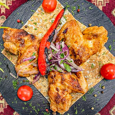 Куриные крылья на мангале в Хочу мясо по цене 440 ₽