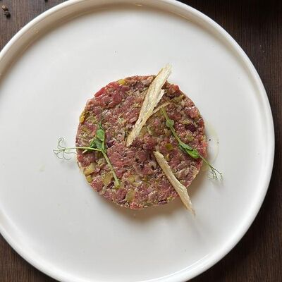 Тартар из говядины в PizzAmore по цене 1250 ₽