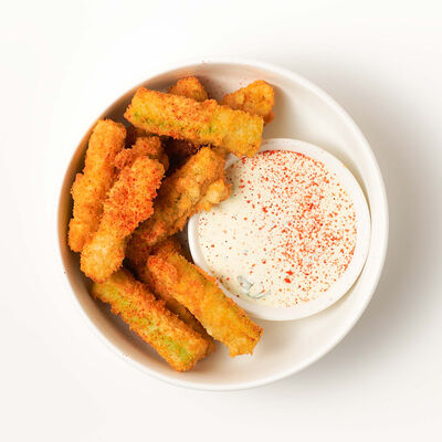 Кабачок фри со сванской солью и соусом шкмерули в Saperavi Cafe по цене 359 ₽