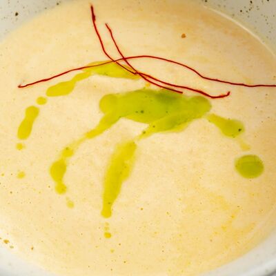 Крем-суп с лососем в Аками рамен по цене 465 ₽