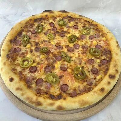 Пицца Мексиканская в Пиросетия Осетинские пироги по цене 986 ₽