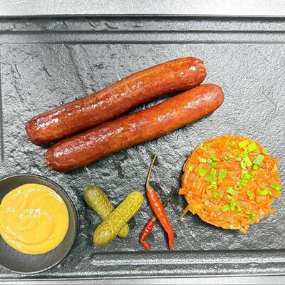 Тирольские с тушенной капустой и корнишонами в Западный сад ! по цене 850 ₽