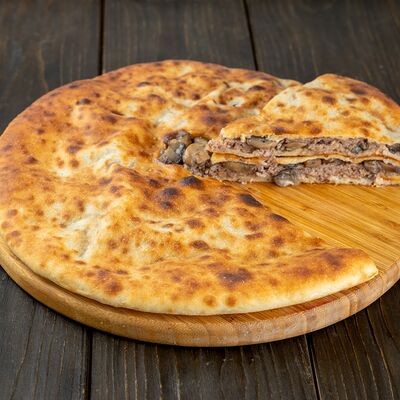 Пирог с мясом и грибами в Осетинские пироги Вкусно Пироги по цене 1100