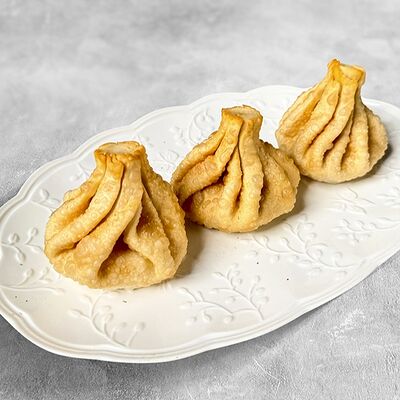 Жареные хинкали со свининой и говядиной в MaMa Mia по цене 241 ₽