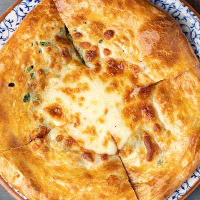 Хачапури по-мегрельски с зеленью в Айва по цене 660 ₽