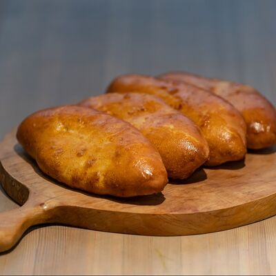 Пирожок с картошкой в Наш Лаваш по цене 105 ₽