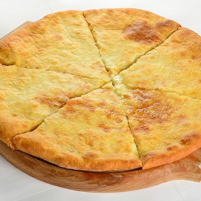 Осетинский пирог с сыром и картошкой в Строгинский шашлык 24 по цене 700 ₽