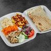 Шаурма с курицей на тарелке в Арабелло фаст фуд по цене 460