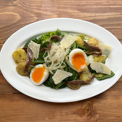 Картофельный салат с анчоусами и яйцомв Прошуттерия по цене 1270 ₽