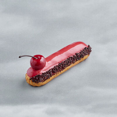 Пирожное Эклер Вишневый в Буше по цене 380 ₽