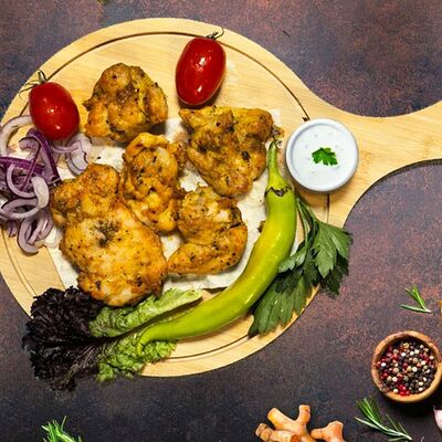 Куриное бедро на углях в Шашлык хаус по цене 910 ₽