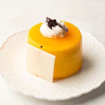 Пирожное Йогуртовое с маракуйейв Север-Метрополь по цене 485 ₽