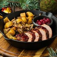 Вырезка из свинины с клюквенным соусом в Mesto Sushi & Grill