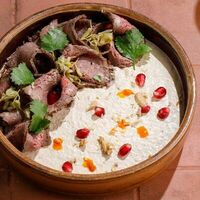 Сациви с ростбифом и джонджоли в Асканели Georgian Bistro