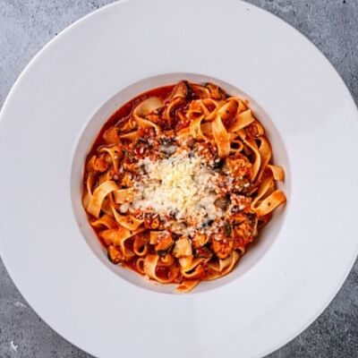 Паста томатная с мидиями в Мидийное место по цене 900 ₽