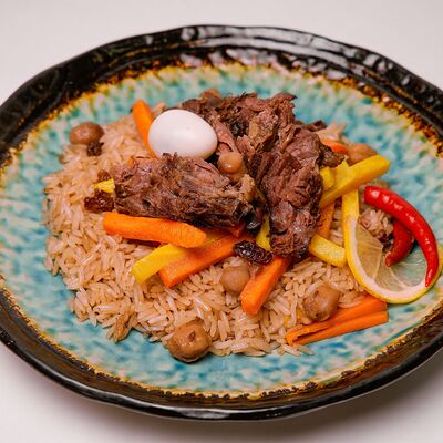 Плов Самаркандский с говядиной на дровах в Бухара по цене 580 ₽