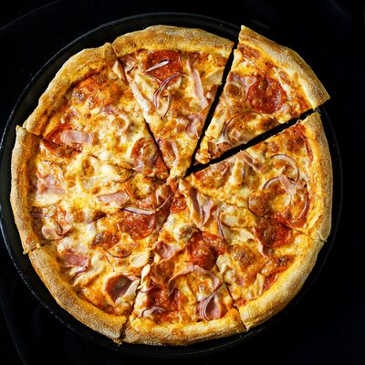 Пицца Фирменная в Temple pizza по цене 949 ₽