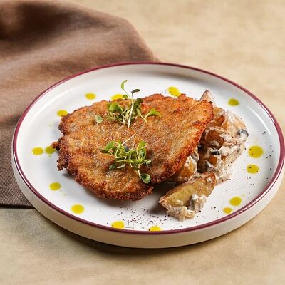 Венский шницель в Компот по цене 620 ₽