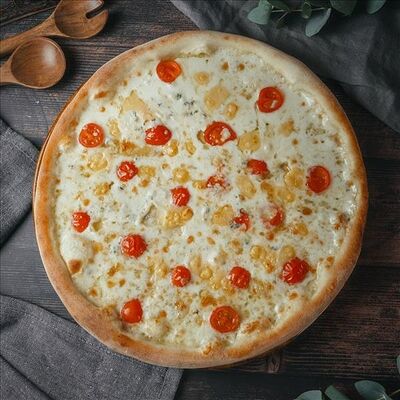 Пицца кватро формаджи в Amato по цене 865 ₽