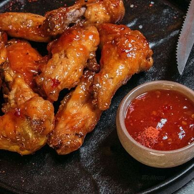 Острые куриные крылышки в Кинза по цене 450 ₽