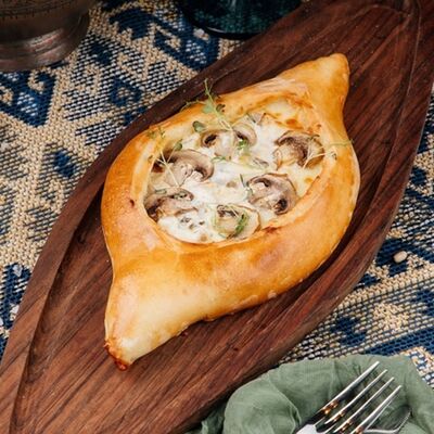 Хачапури с курицей и грибами в ШБ Next по цене 570 ₽