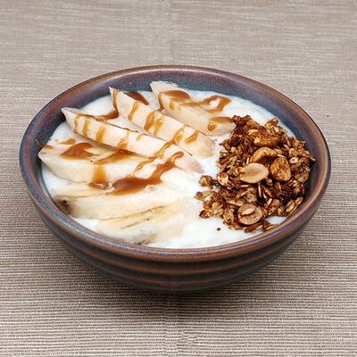Каша рисовая с гранолой и бананом в Кафе-пекарня Susser по цене 265 ₽