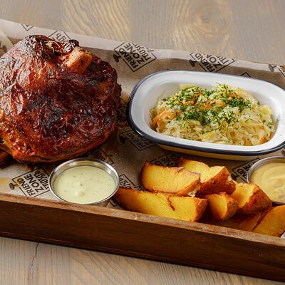 Запеченная свиная рулька в Friend Zone Гвоздь по цене 1299 ₽