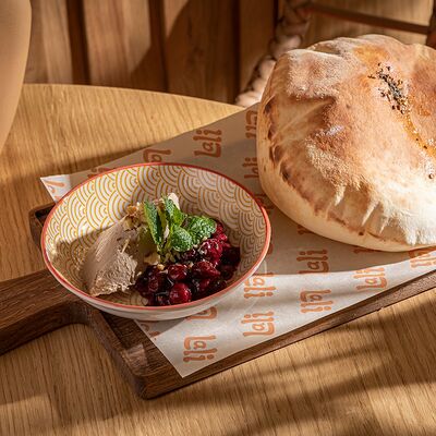 Паштет из куриной печени с вишневым соусом и грецким орехом в Lali по цене 680 ₽